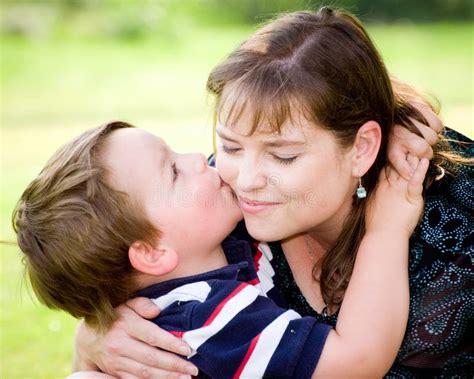 mother and son kiss|Mother Son Sofa Kissing stock videos and footage